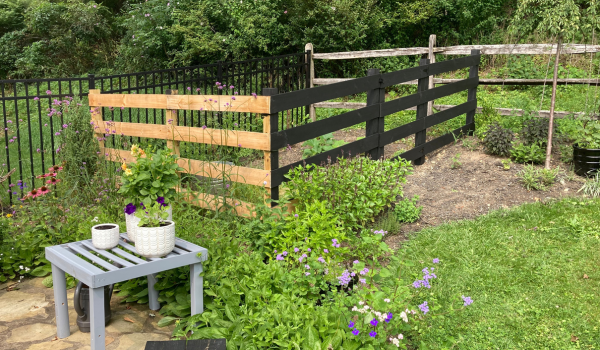 painted black fence for the fruit garden